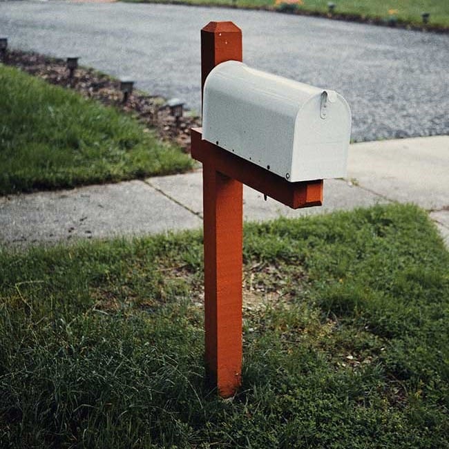 Mailbox at the end of a driveway